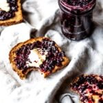 blackberry jam on toast with jar of jam on the side
