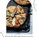 Focaccia sliced and covered with herbs