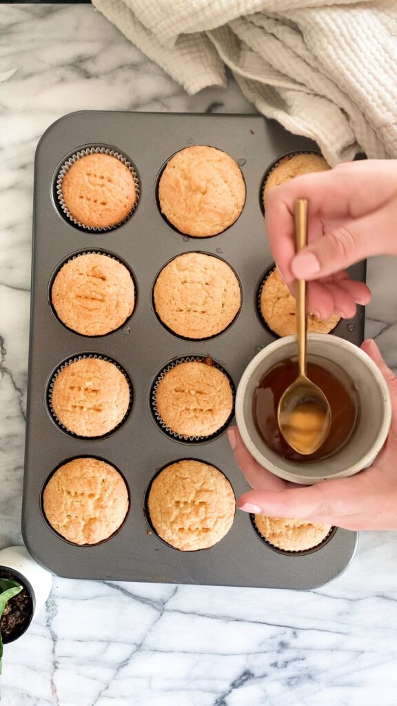Drizzle all the syrup over the cupcakes