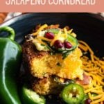 wo slices of jalapeño cornbread stacked on top of each other topped with jalapeño slices.