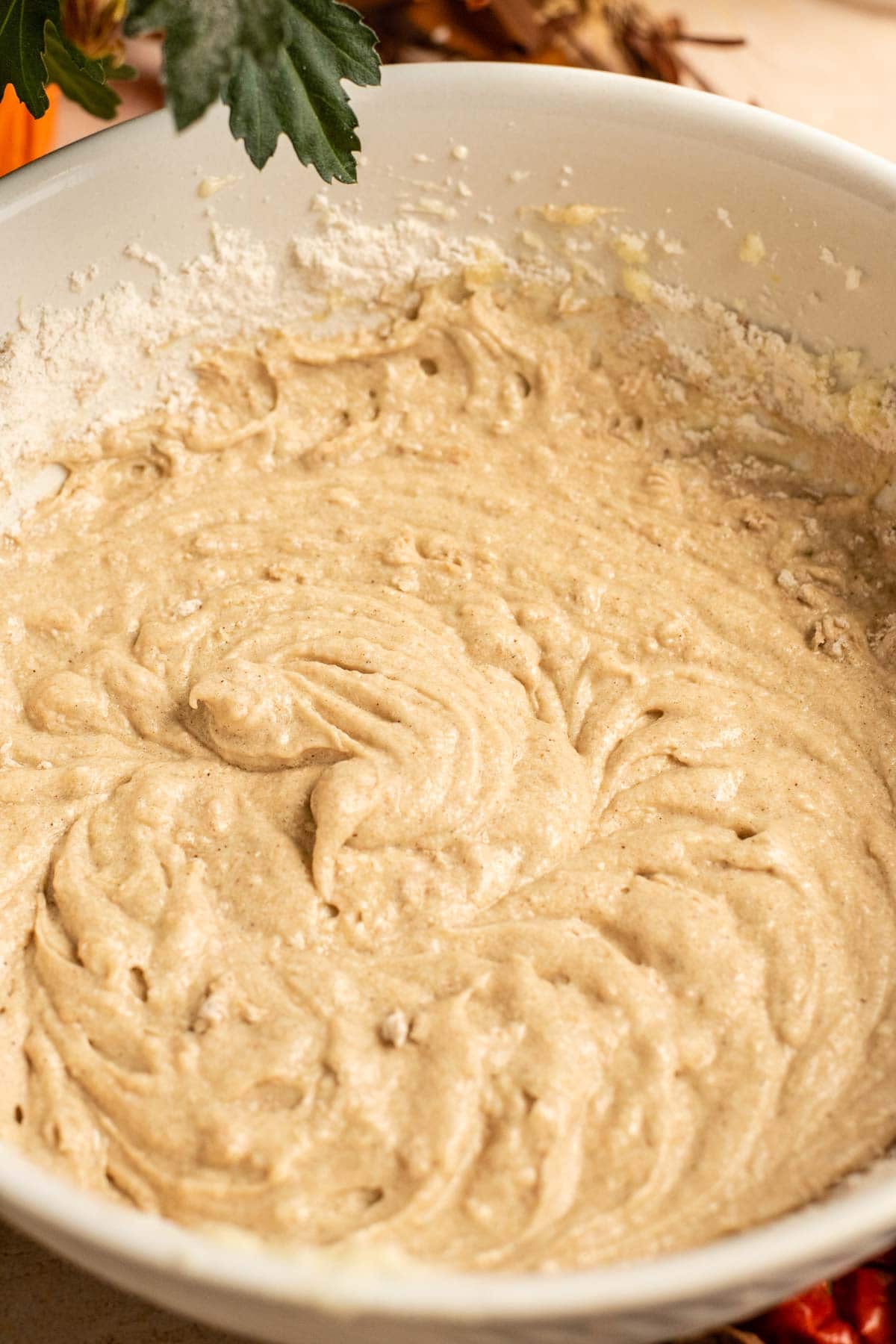 The mixed batter in a large mixing bowl.