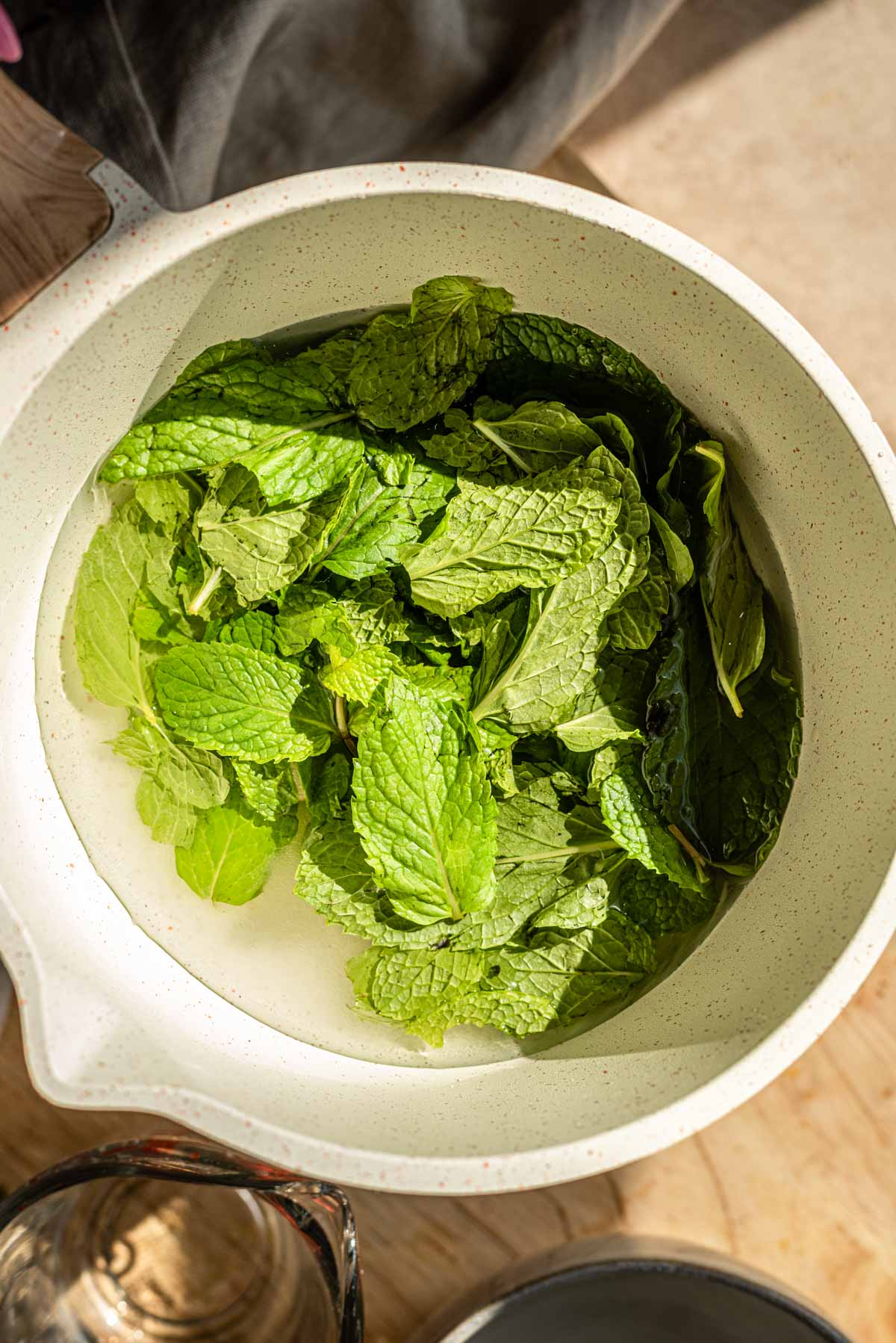 Fresh mint in with the sugar and water.