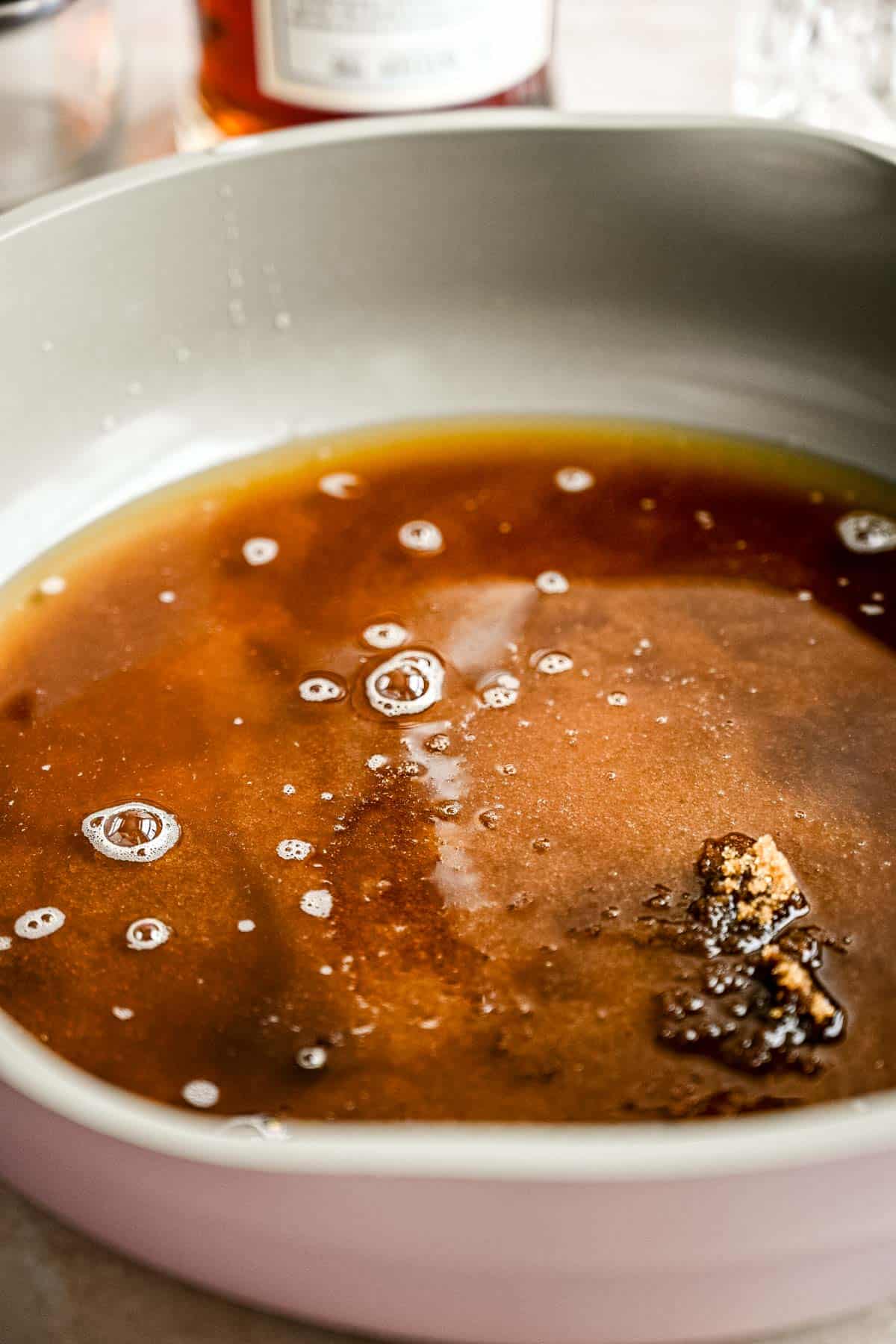 Water and the light brown sugar in a sauce pan.