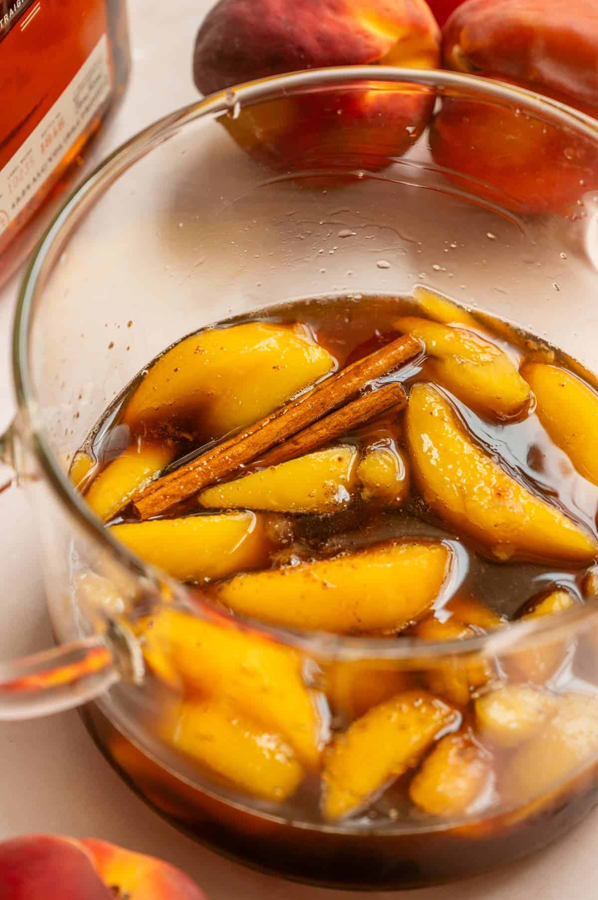 All the ingredients for the syrup in a glass pot.