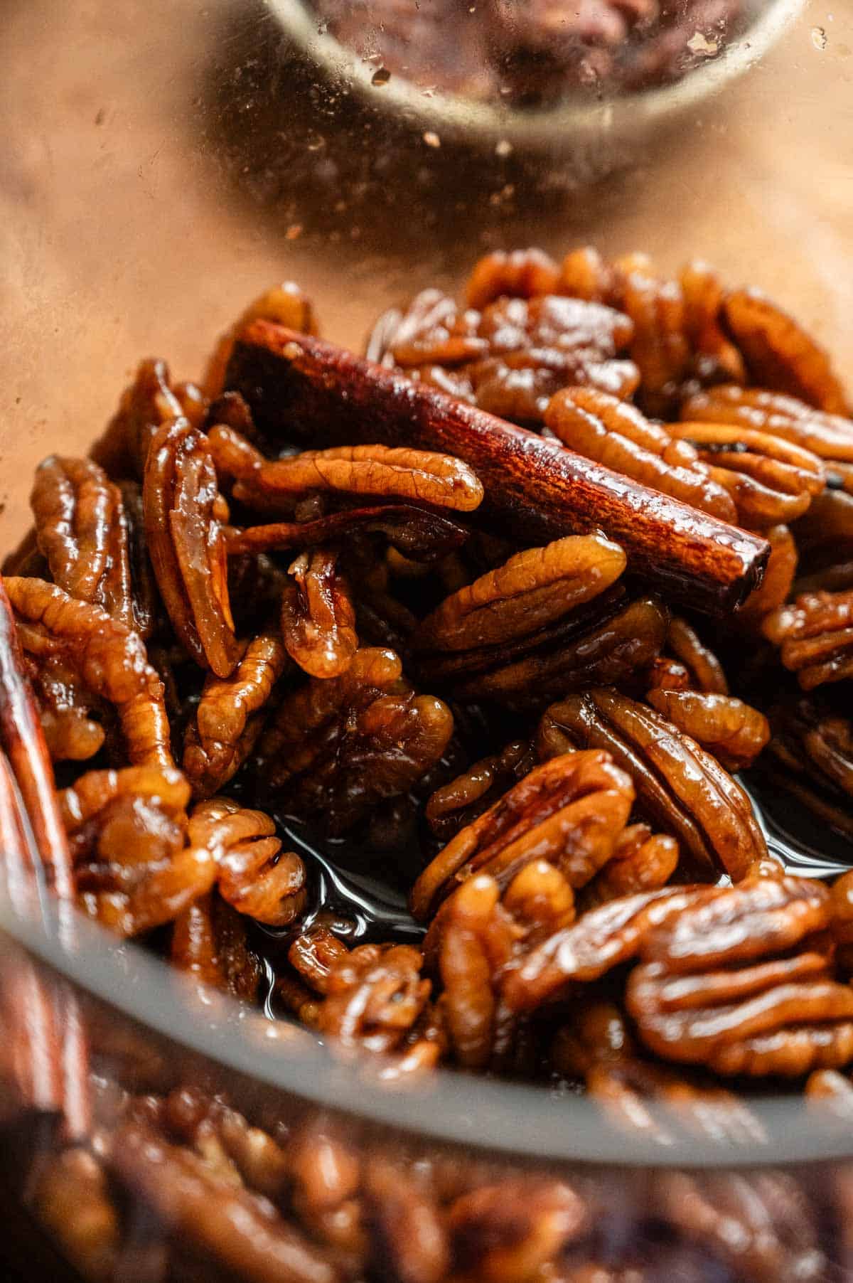 Pecans cooked in water and brown sugar.