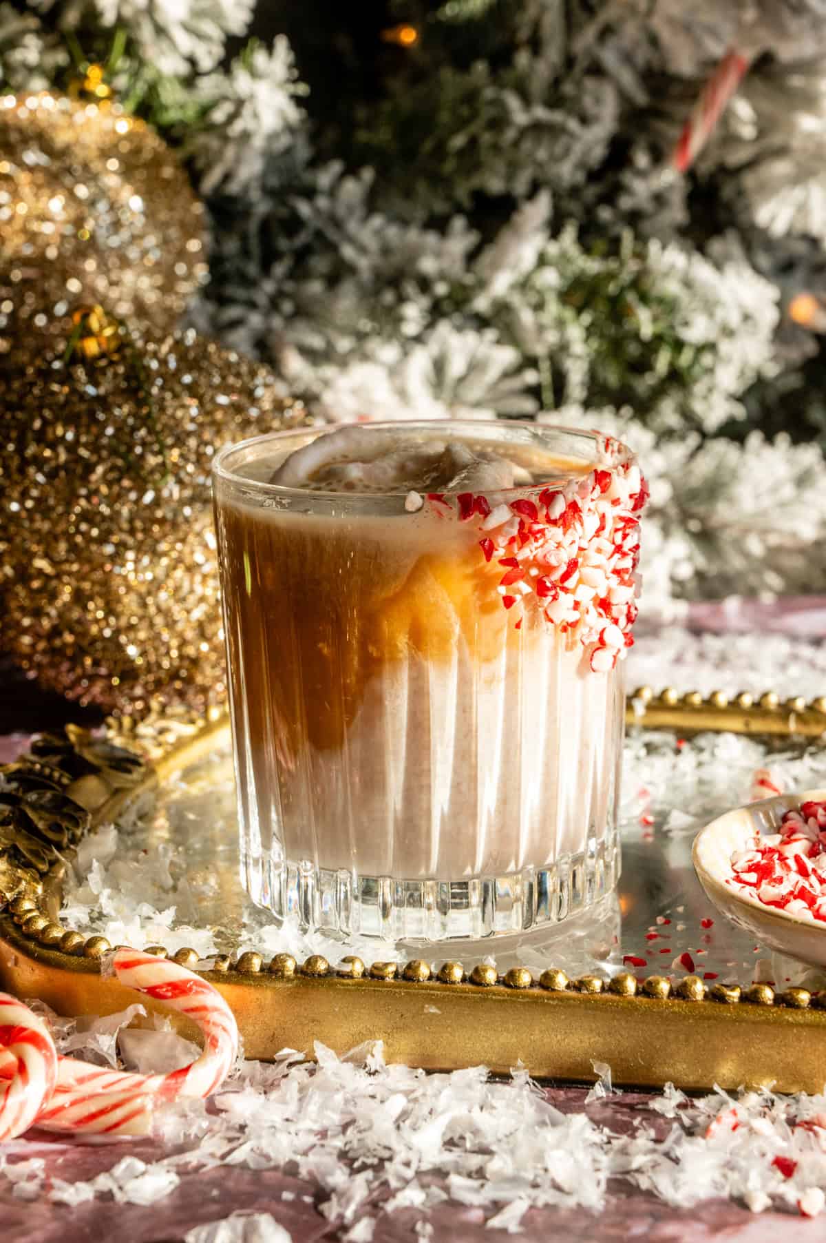 The espresso has been poured on top of the ice cream and is sitting on top.