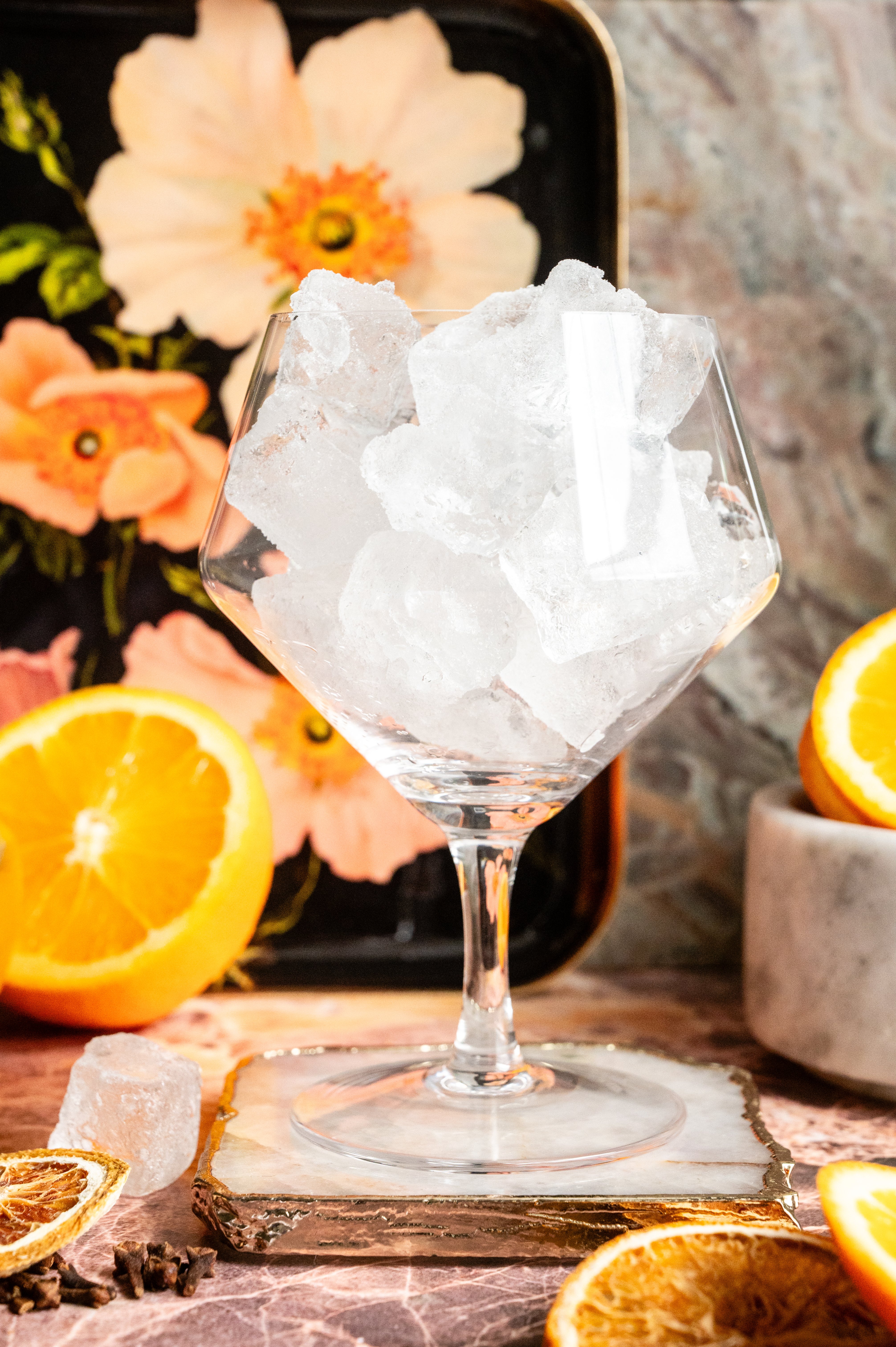 A balloon glass filled with ice.