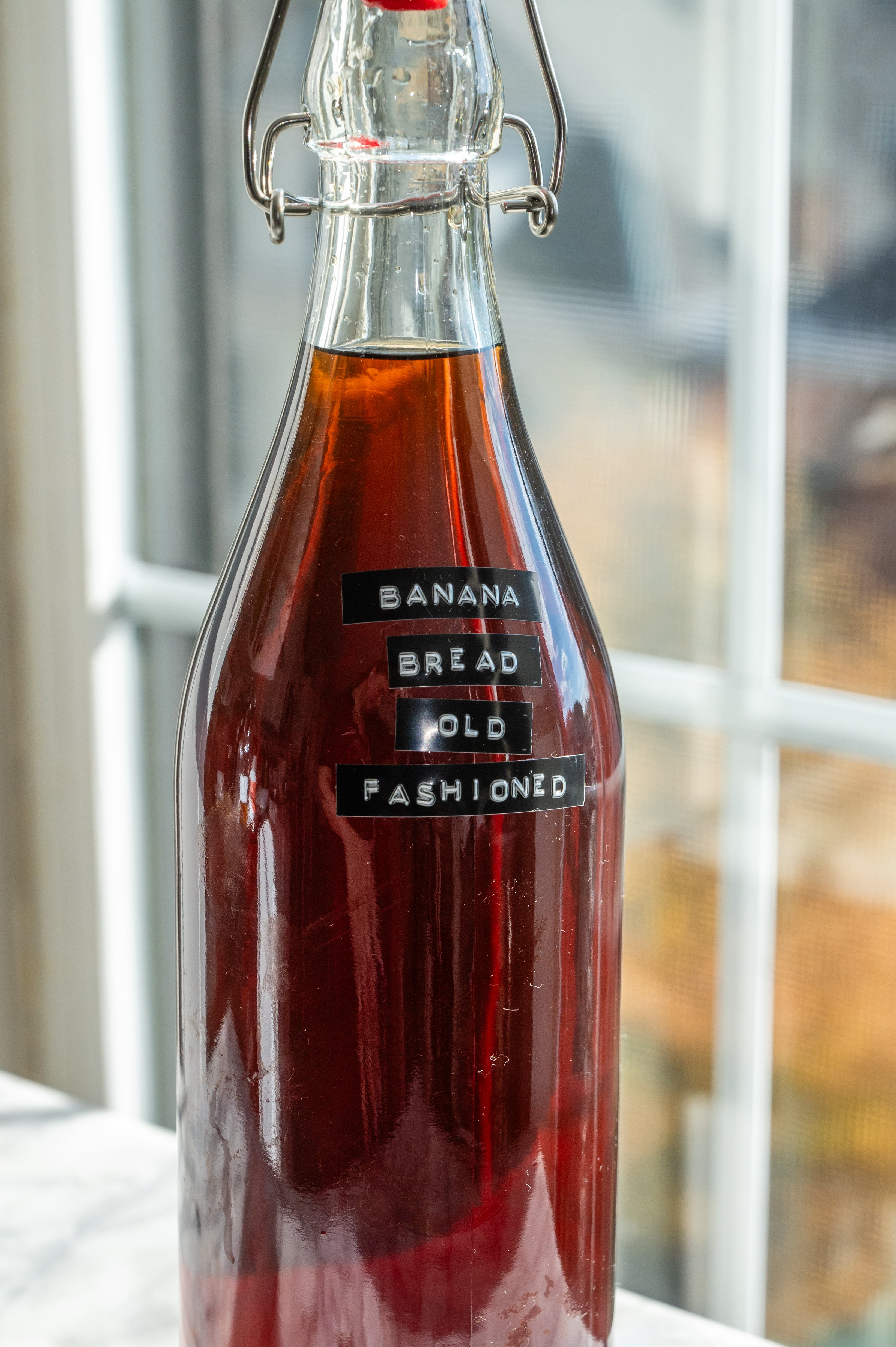 The bitters have been added and the drink has been sealed.