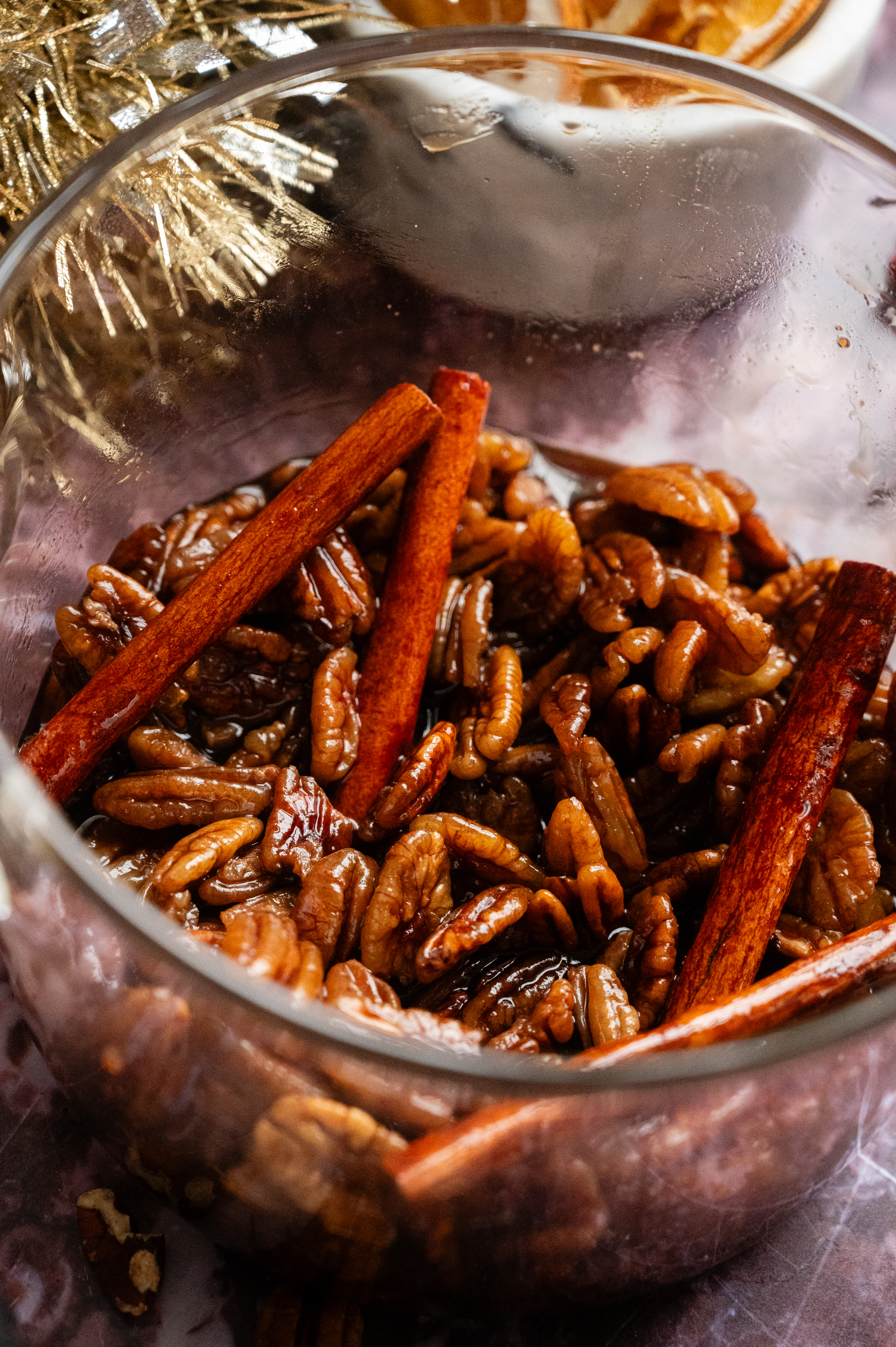 The finished pecan syrup in a glass saucepan.