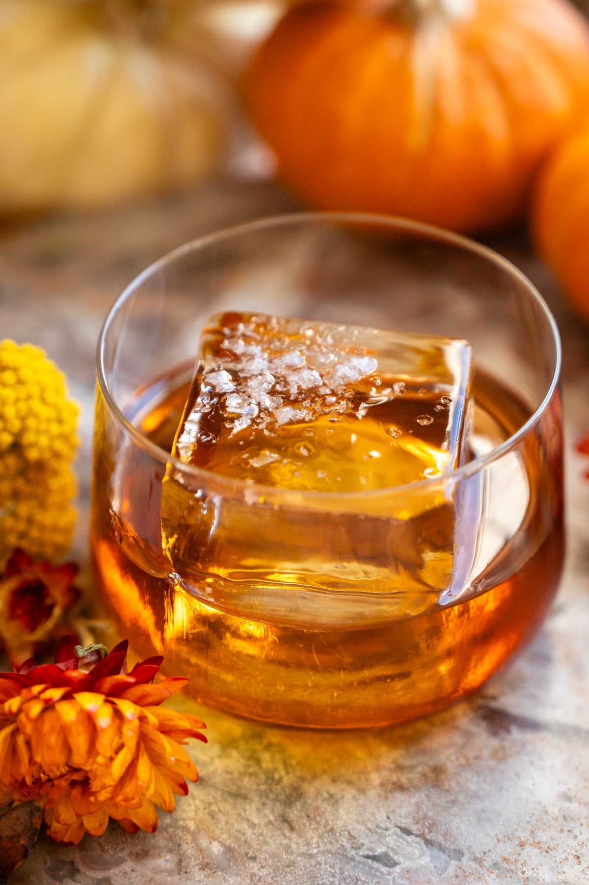 maple syrup and sea salt have been added to glass.