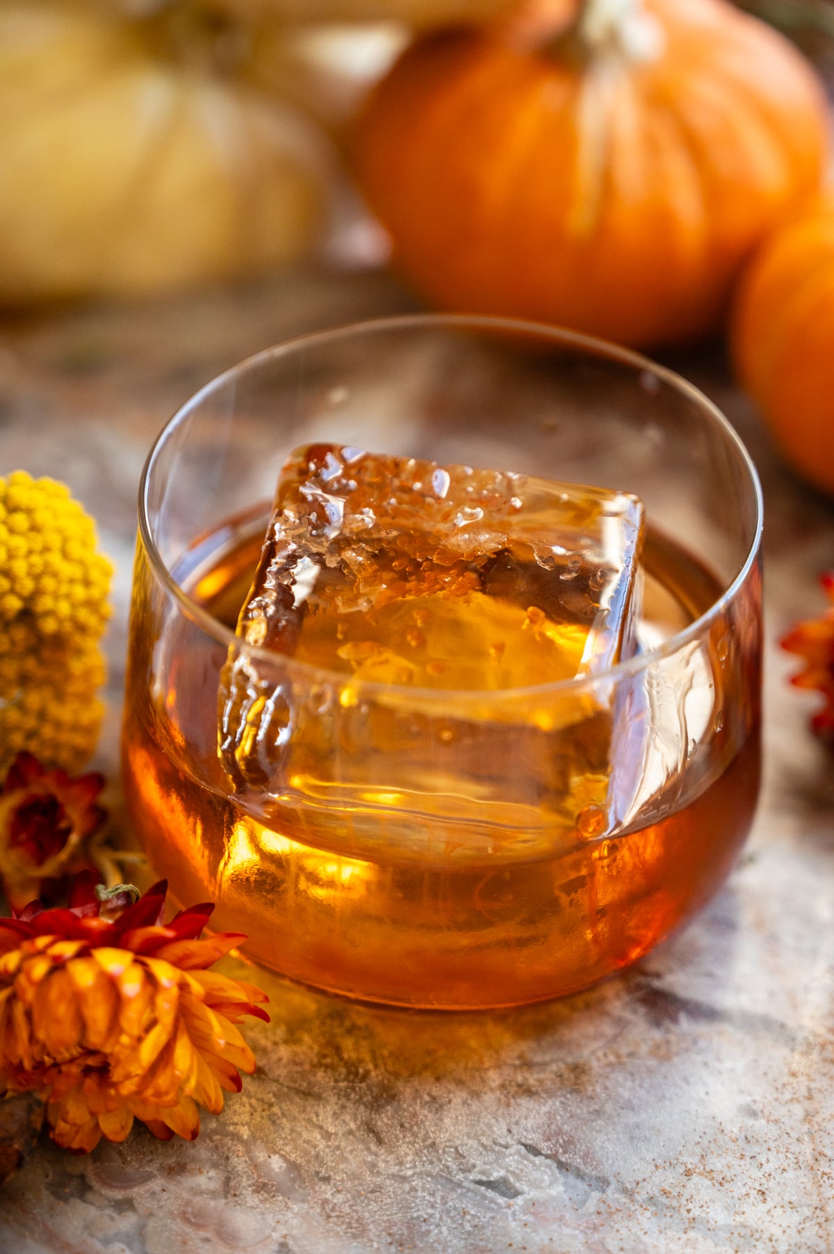 Bitters have been added on top of the drink.