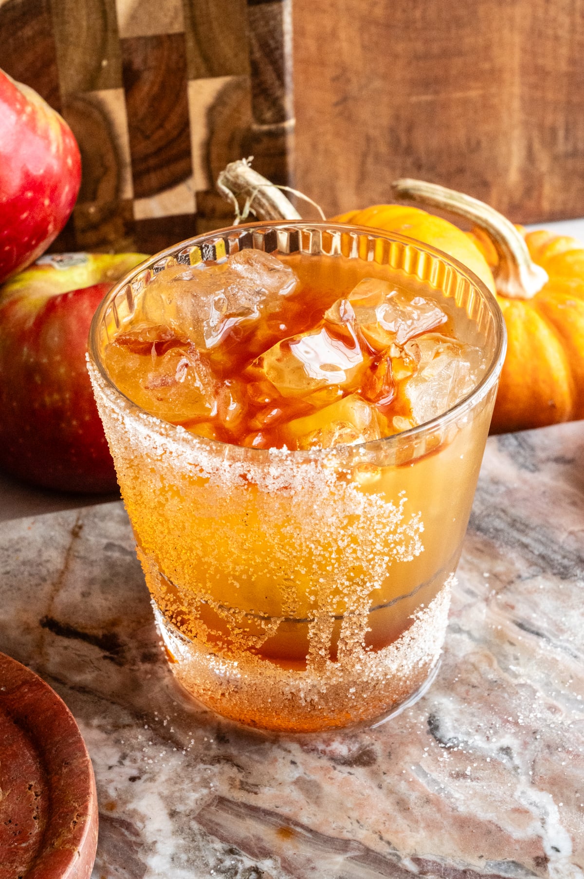 The bitters have been added and are floating at the top of the drink.